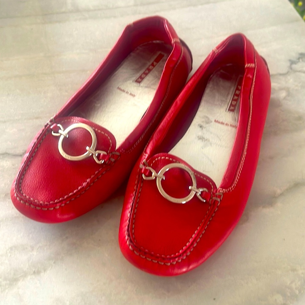 Prada woman’s loafer/driving shoe red in color size 36.